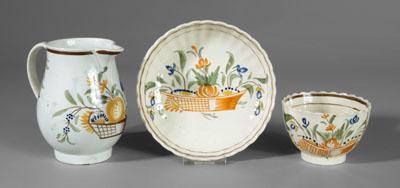 Appraisal: Pearlware cup and saucer creamer all with baskets of flowers