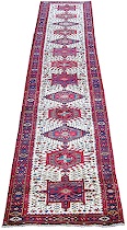 Appraisal: A Semi-antique Heriz Rug A semi-antique Heriz rug runner with