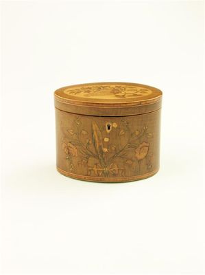 Appraisal: A George III harewood oval tea caddy the front inlaid