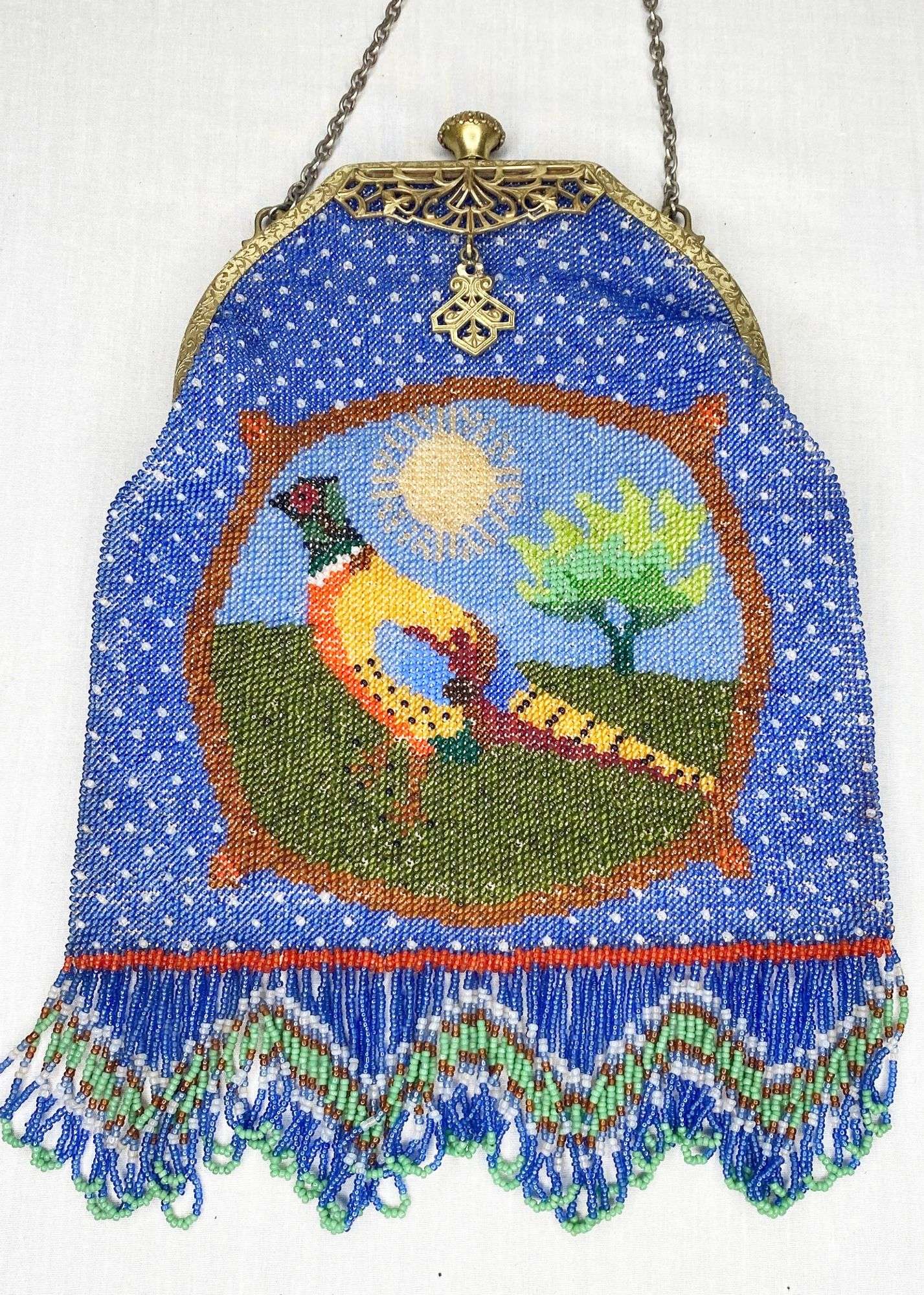 Appraisal: Micro Beaded Hand Bag with Pheasant long including fringe widest