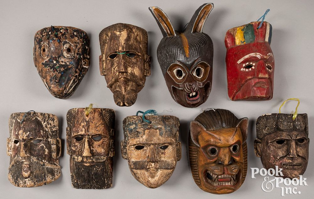 Appraisal: Nine carved and painted Mexican masks Nine carved and painted