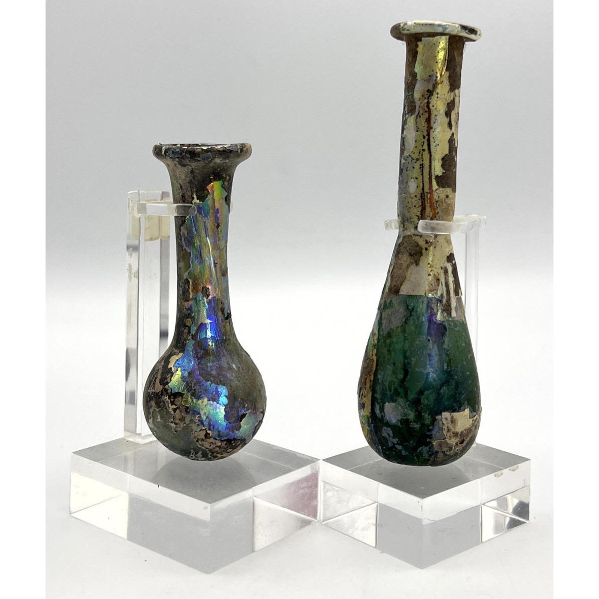 Appraisal: pc Ancient Roman glass vases Iridescent with loop decoration Dimensions