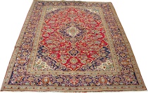 Appraisal: A Kashan Carpet Classic Kashan design with bright red centerfield