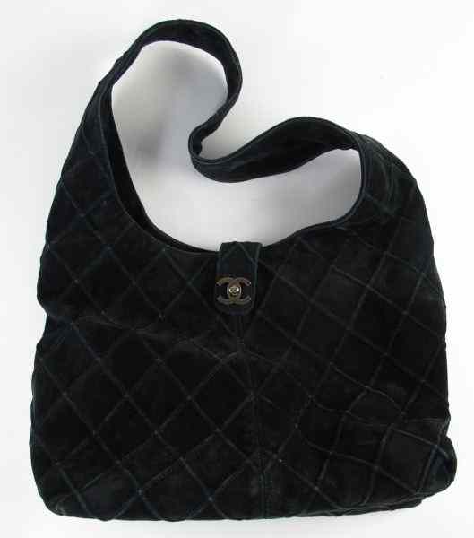 Appraisal: Quilted Suede Hobo Bag Chaneldesigned as a continuous shoulder hobo