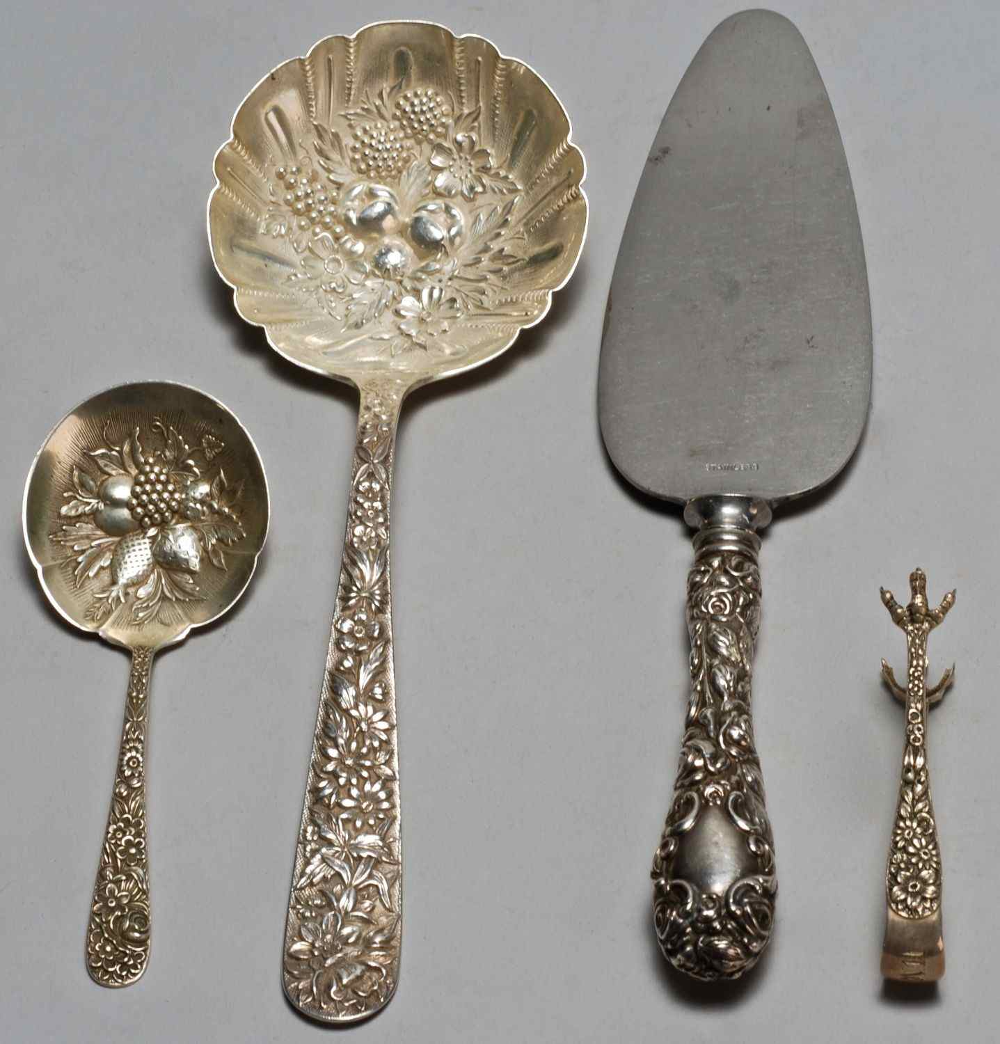 Appraisal: FOUR STERLING SILVER REPOUSS SERVING PIECESPie knife with sterling silver-mounted