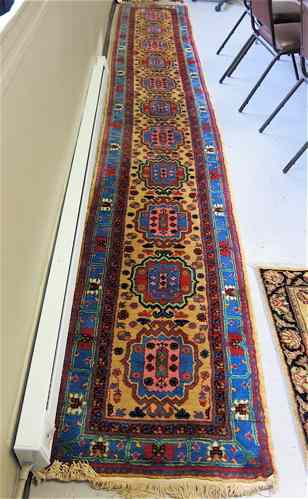 Appraisal: SAMARKAND RUNNER Uzbekistan Samarqand Province hand knotted repeating medallion design