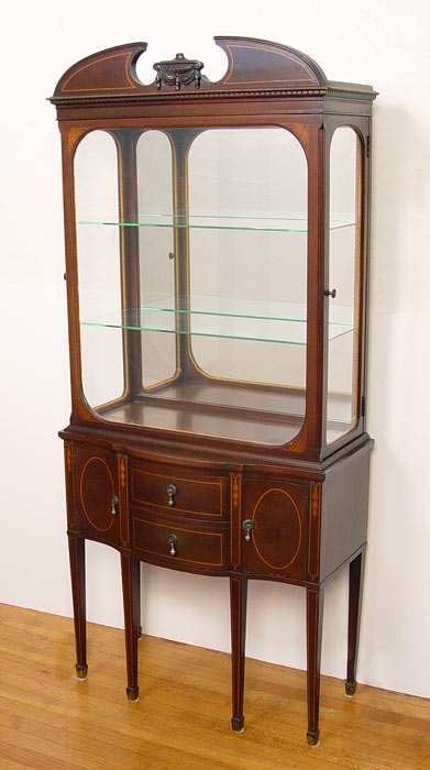 Appraisal: HEPPLEWHITE STYLE DIMINUTIVE CURIO Mirrored back with glass shelves over