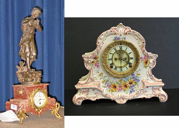 Appraisal: A French patinated metal and griotte marble figural clock and