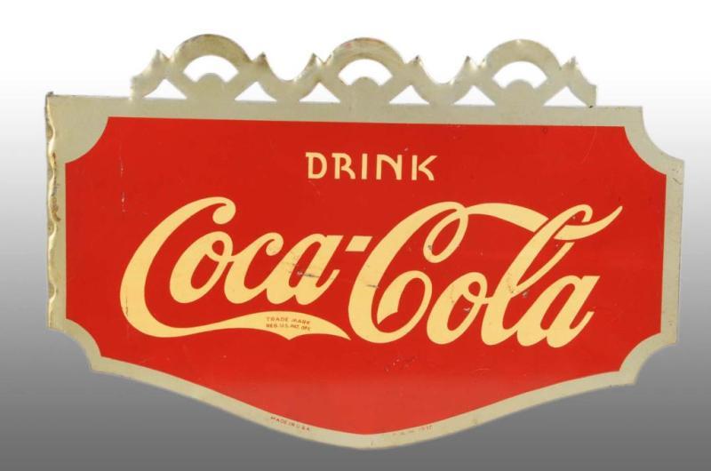 Appraisal: Tin Coca-Cola Die-Cut Flange Sign Description Some minor edge and