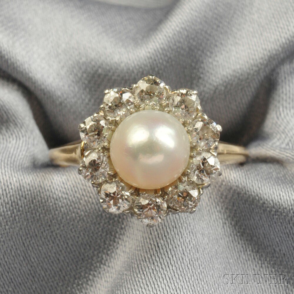 Appraisal: Pearl and Diamond Ring set with a pearl measuring approx