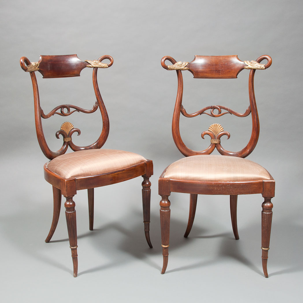 Appraisal: Pair of Russian Neoclassical Style Carved and Parcel Gilt Mahogany