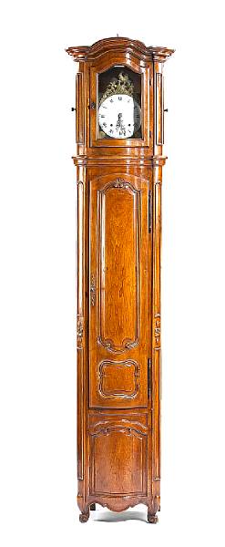 Appraisal: A Louis XV walnut regulateur The cavetto stepped arched cornice