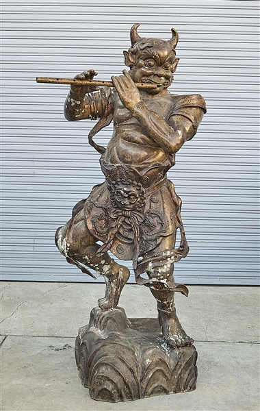 Appraisal: Large Chinese bronze deity playing an instrument Xuande mark but