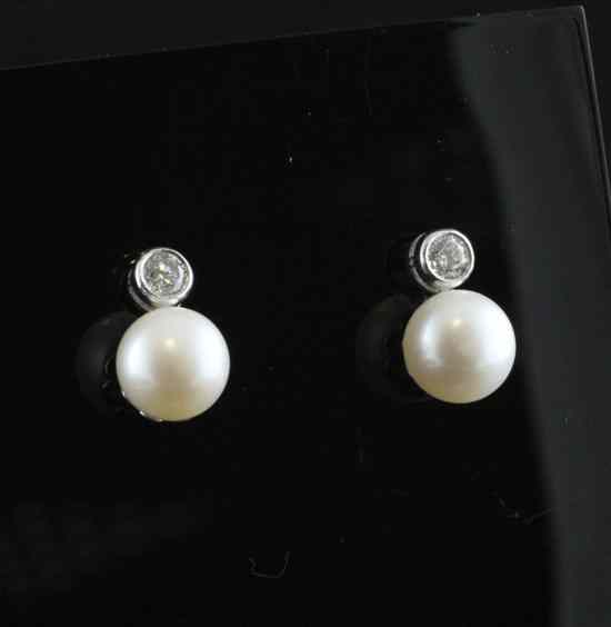 Appraisal: A pair of ct white gold diamond and cultured pearl