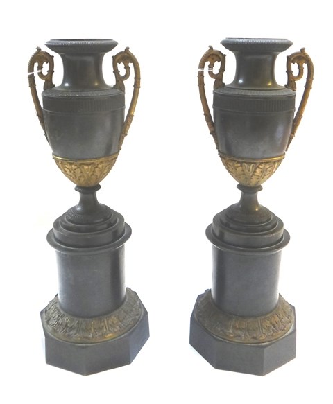 Appraisal: A pair of gilt and patinated bronze urn garnitures late