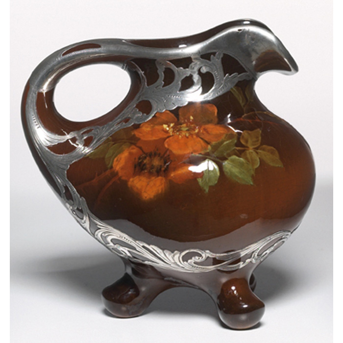 Appraisal: Good Owens Utopian ewer three footed form in a brown