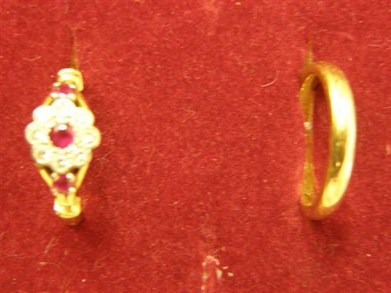 Appraisal: ct gold wedding band and a ruby and diamond cluster