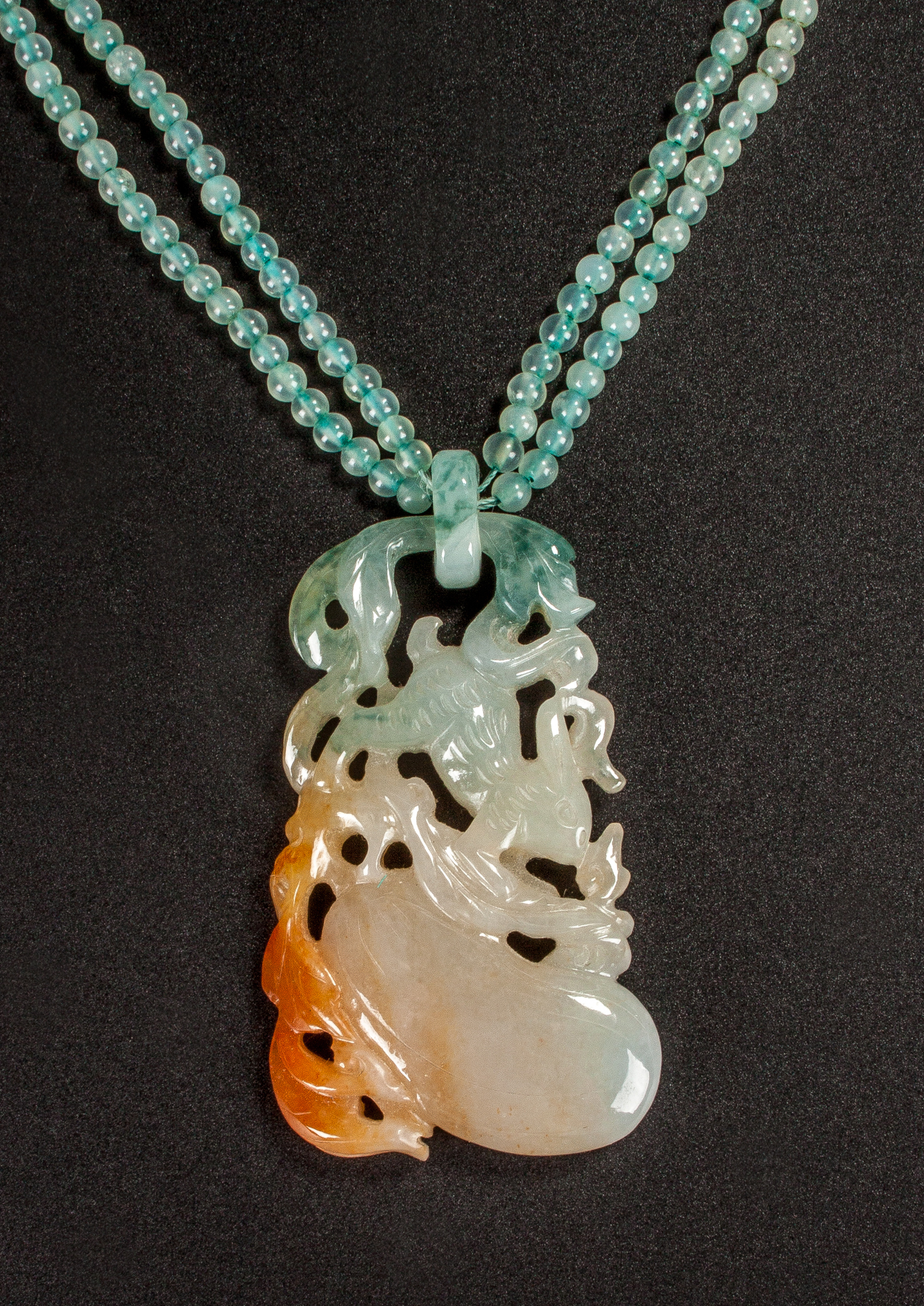 Appraisal: Tricolored Jade Pendant of Rabbit and Gourd On a beaded