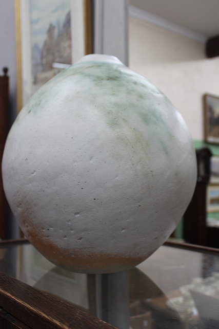 Appraisal: AN OVOID STUDIO POTTERY VESSEL with eggshell and green colouring