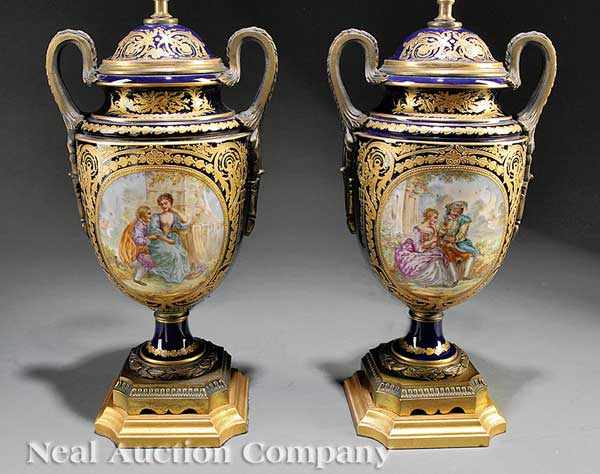 Appraisal: A Pair of S vres-Style Bronze-Mounted Vases th c cobalt