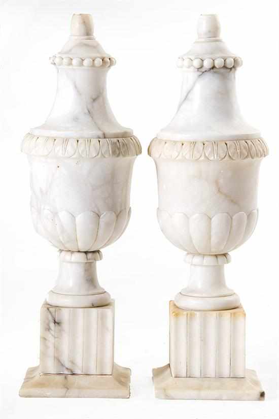 Appraisal: Pair Continental carved marble lamps early th century urn on