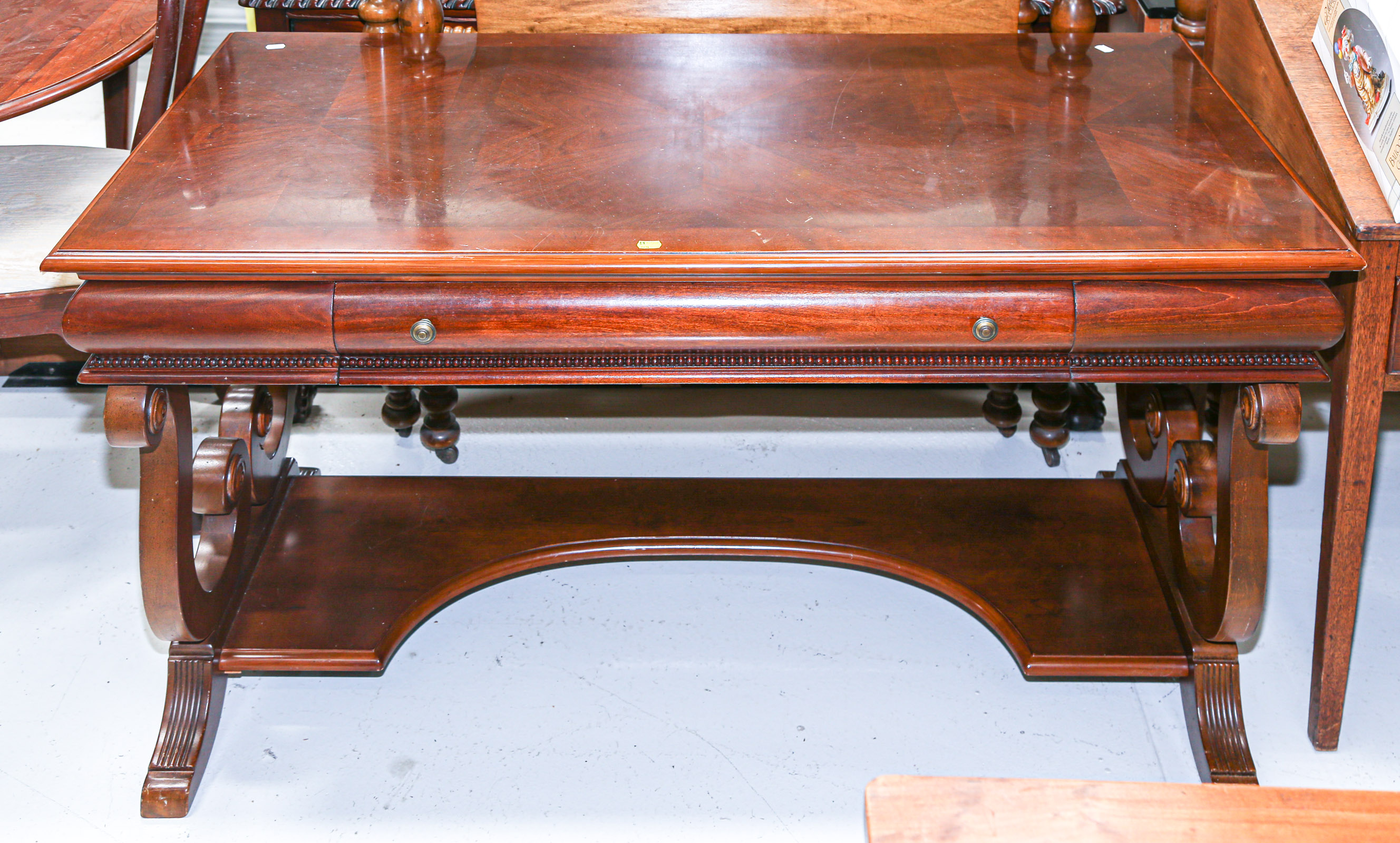 Appraisal: NEOCLASSICAL STYLE MAHOGANY LIBRARY TABLE Modern in H in W