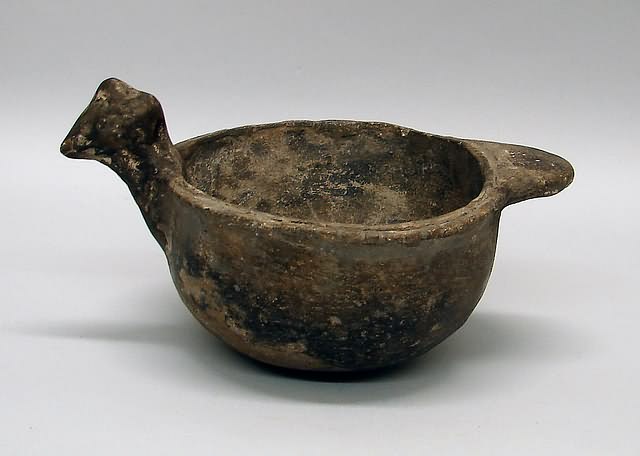 Appraisal: Bird form prehistoric tall bowl opening measures x Ship plus