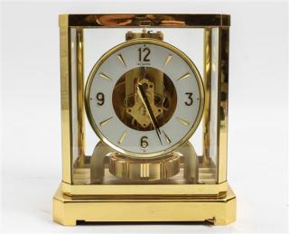 Appraisal: A LeCoultre Brass and Glass Atmos Clock Height x width