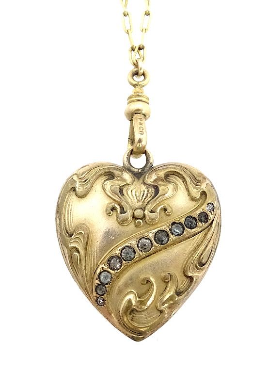 Appraisal: K Heart Locket with necklace K Heart Locket with necklace