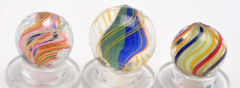 Appraisal: Lot of Swirl Marbles Description Includes one three-stage double latticino