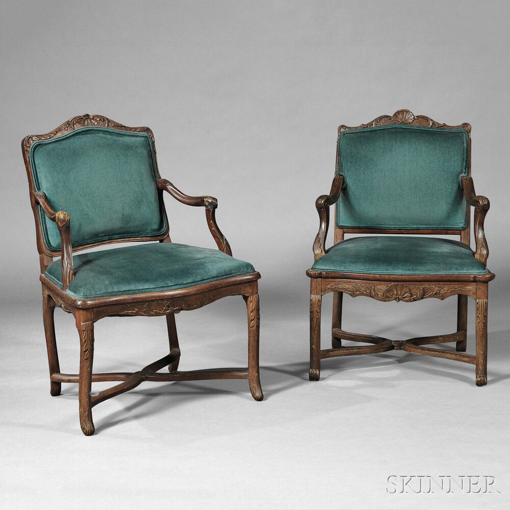 Appraisal: Two Upholstered Shell-carved Open Armchairs French Canada late th early