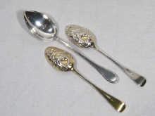 Appraisal: A pair of silver berry table spoons London together with