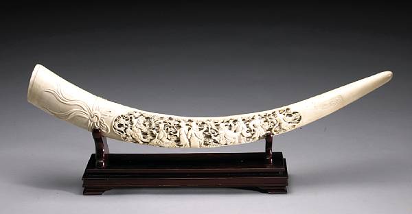 Appraisal: A large ivory tusk th Century Carved and undercut to