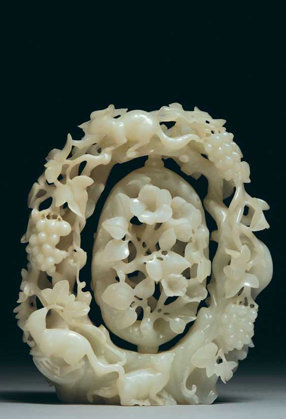 Appraisal: FINE WHITE JADE FLORAL CARVING Fine and intricately carved Chinese