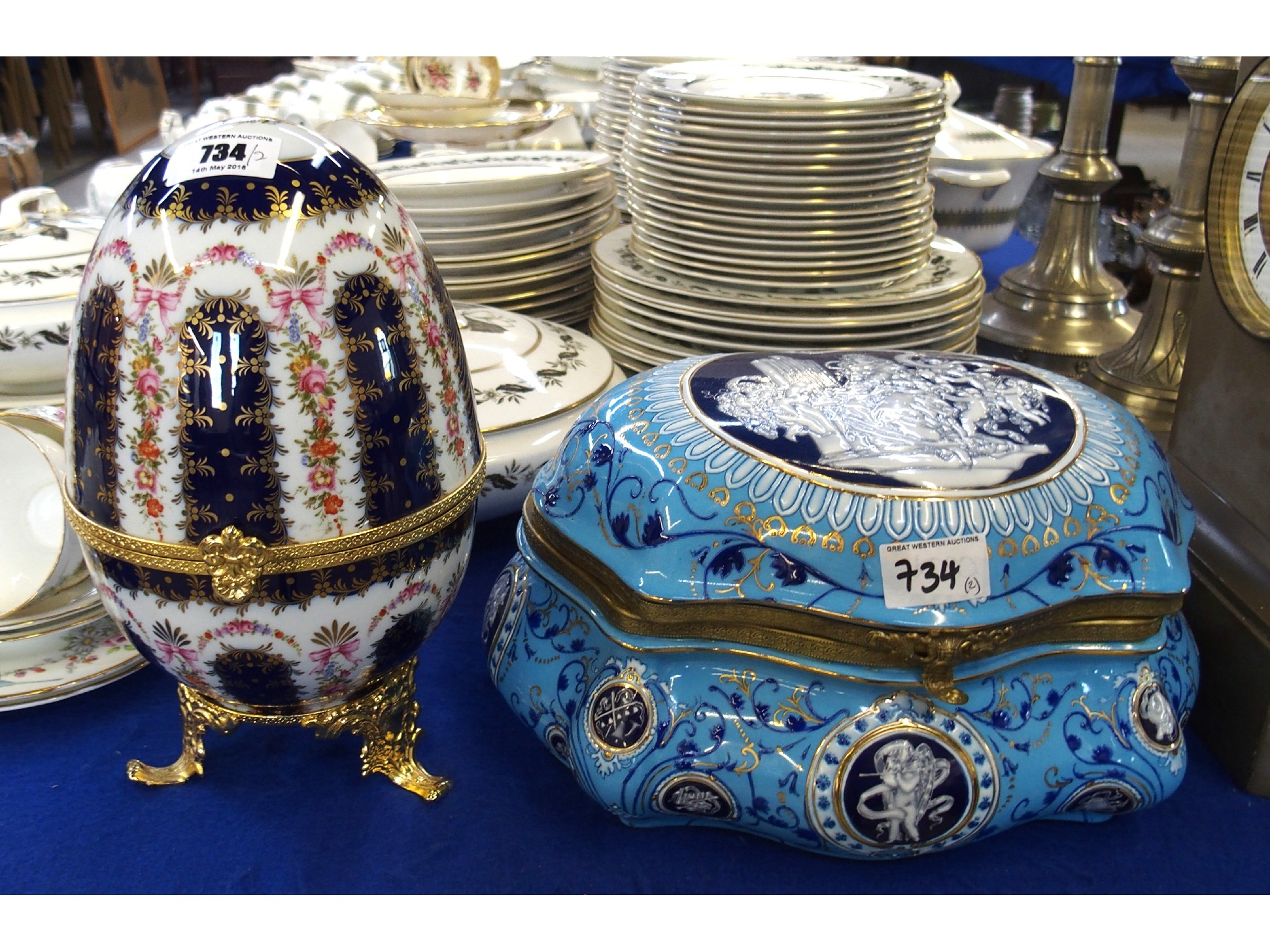 Appraisal: Porcelain casket and an ornamental egg casket on stand