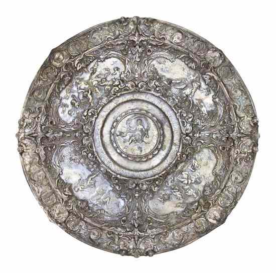 Appraisal: A Continental Silvered Metal Relief Plaque of circular form decorated