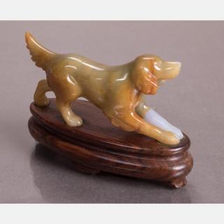 Appraisal: A Carved Agate Dog Figure on a Carved Hardwood Stand