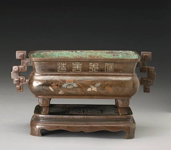 Appraisal: A mixed metal-inlaid bronze censer and stand Vietnam th th