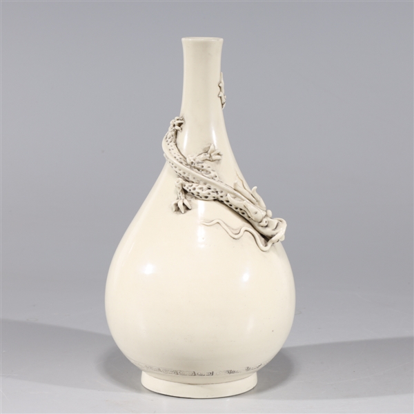 Appraisal: Chinese yellow glazed porcelain vase with dragon in high relief