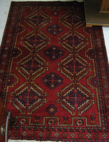 Appraisal: TWO PERSIAN BELOUCHI TRIBAL AREA RUGS both hand knotted in