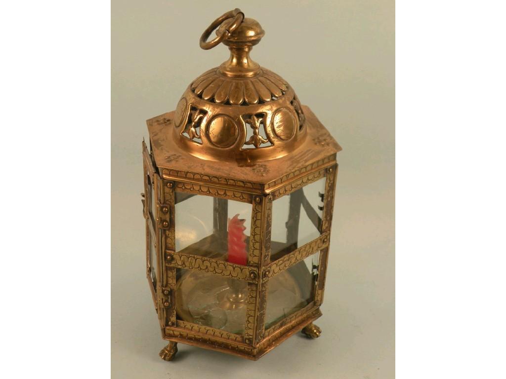 Appraisal: A continental pierced brass hexagonal lantern glass panels and ball