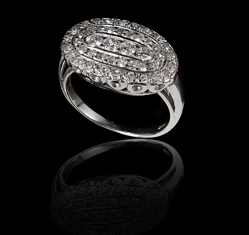 Appraisal: K RETRO DIAMOND RING K white gold ring contains round