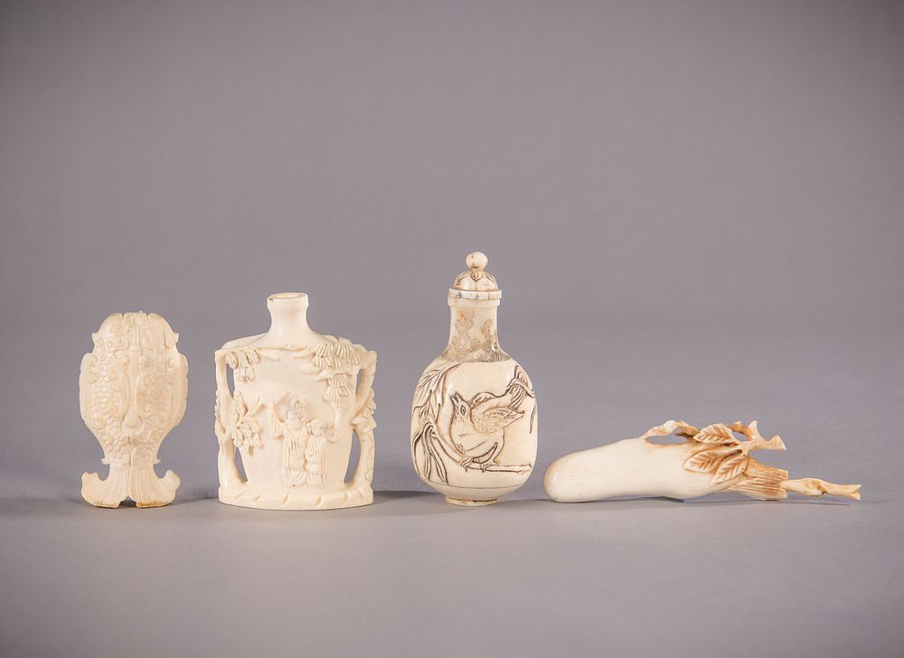 Appraisal: Carved Ivory Snuff Bottles Carved fox ivory pictorial snuff botle