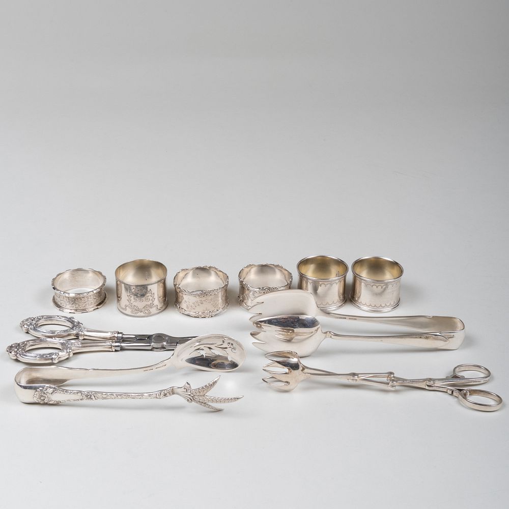 Appraisal: Group of Silver Tongs and Napkin Rings Comprising Two pairs