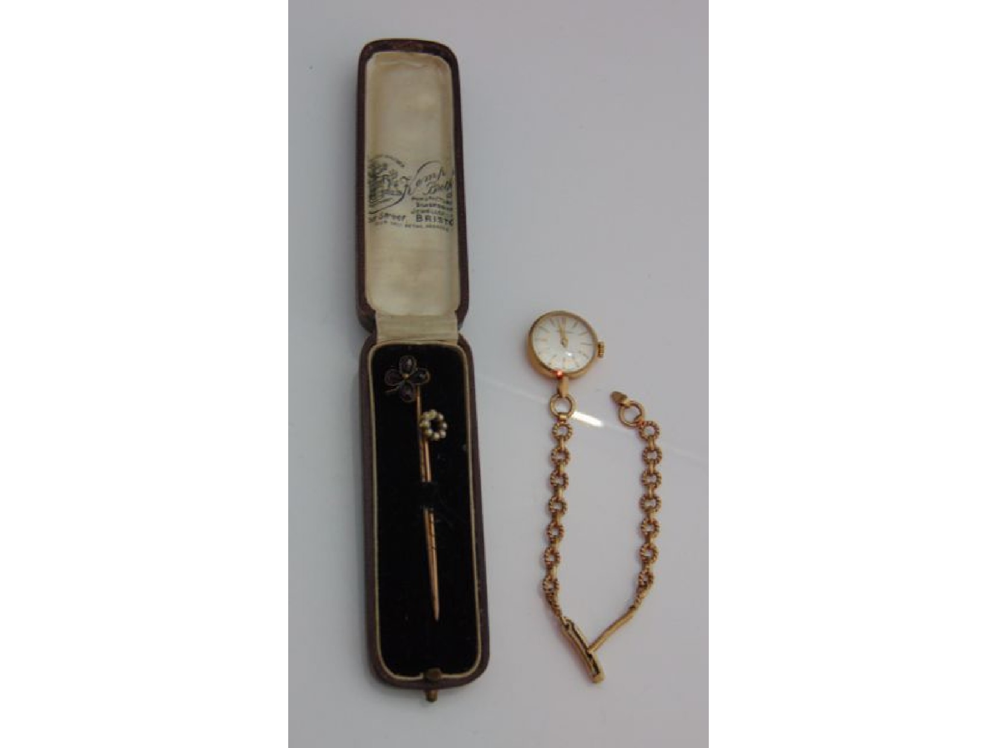 Appraisal: A lady's ct gold wristwatch Garrard the silvered dial with