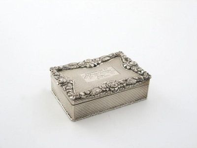 Appraisal: A Victorian silver presentation snuff box rectangular form engine turned