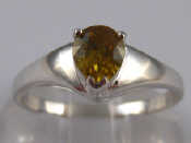 Appraisal: A white metal tests carat gold yellow zircon ring size