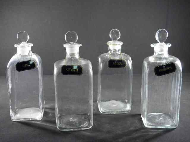 Appraisal: Lot of four th century hand blown glass decanters Square