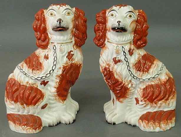 Appraisal: Pair of th c Staffordshire red and white seated spaniels