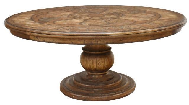 Appraisal: Large circular parquetry top dining table rising on a bulbous